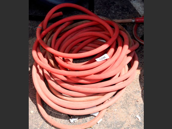 RED FIRE HOSE WITH NOZZLE
