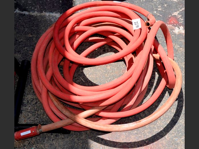 RED FIRE HOSE WITH NOZZLE