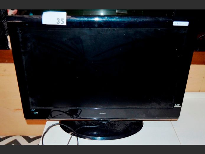 BUSH 24" FULL HD TV ON STAND WITH BUILT-IN DVD PLAYER [UK Plug, No Remote, Switches on, screen cracked] ### LICENCE PLEASE ###