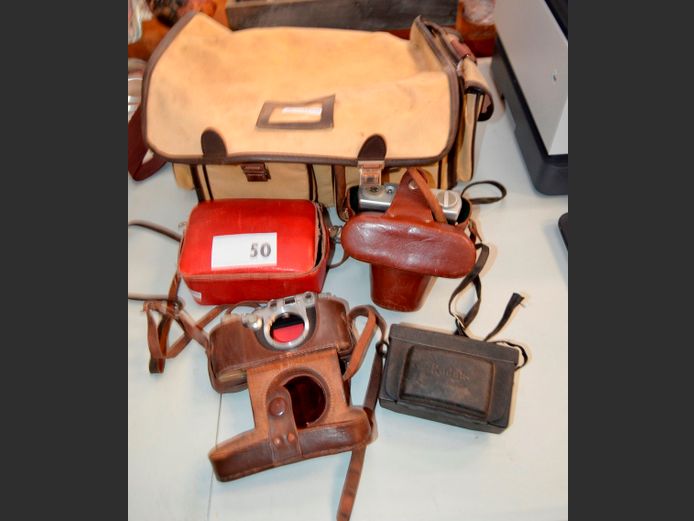 LOT OF 4: VINTAGE CAMERAS IN BAG [Condition unknown]