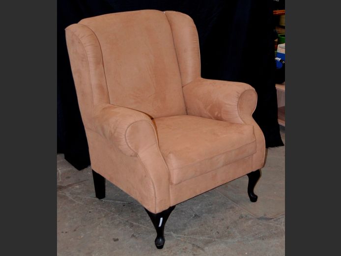 BEIGE UPHOLSTERED WINGBACK ARMCHAIR [Needs re-covering]