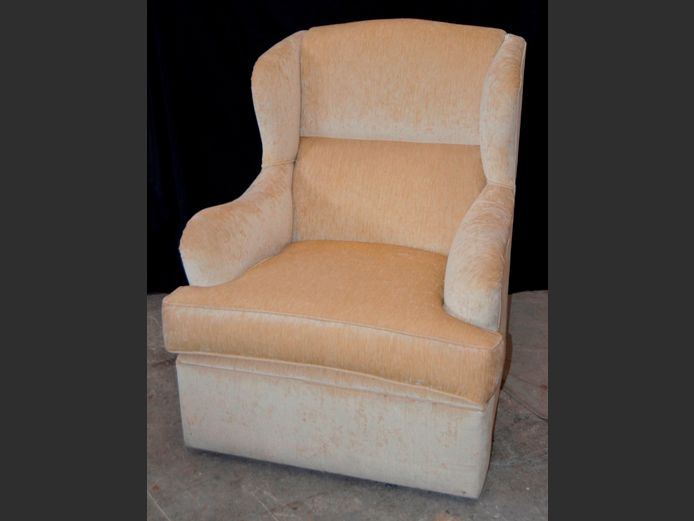 BEIGE UPHOLSTERED WINGBACK ARMCHAIR