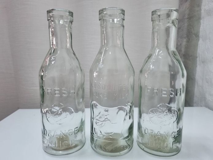 Vintage-Style Embossed Glass Milk and Juice Bottles with Spouted Rims