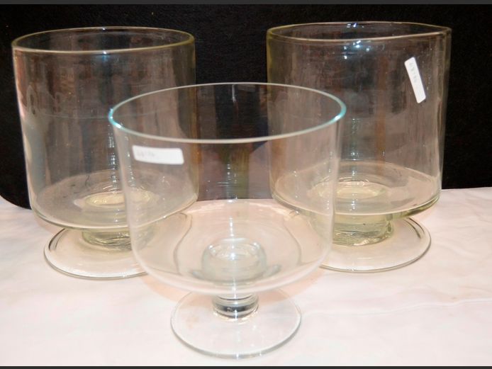 SET OF 3 CLEAR GLASS FOOTED CYLINDRICAL VASES, 19.5cm Diameter x 25cm (x2) & 20cm Diameter x 21cm High