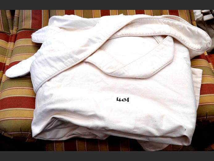 PAIR CREAM LINED CURTAINS WITH TIEBACKS