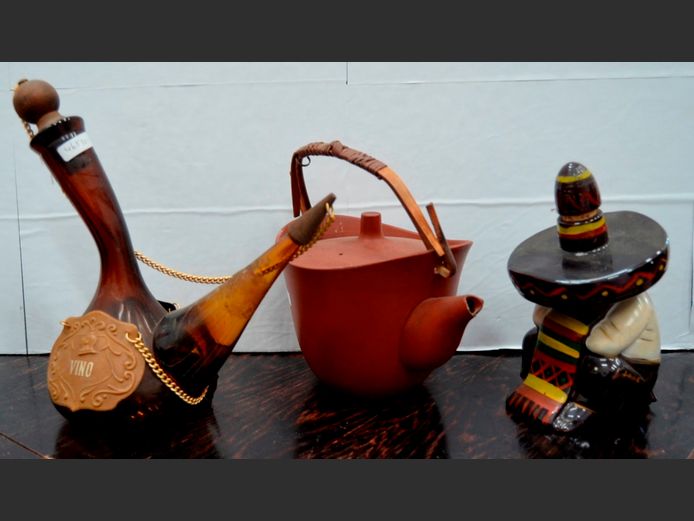 GLASS & LEATHER WINE DECANTER, TERRACOTTA TEAPOT & A MEXICAN ORNAMENT