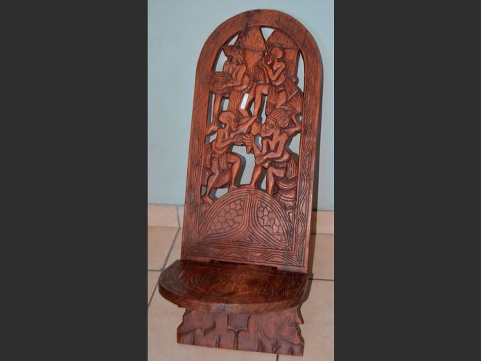 CARVED AFRICAN CHAIR