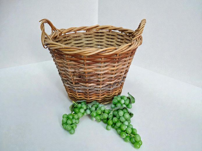 Vintage Harvest Wicker Basket with Decorative Grapes