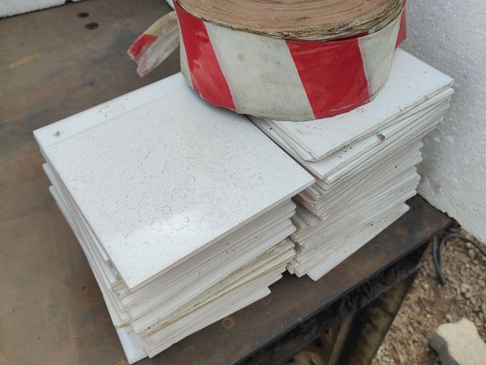 LOT TILES AND ROLL DANGER TAPE