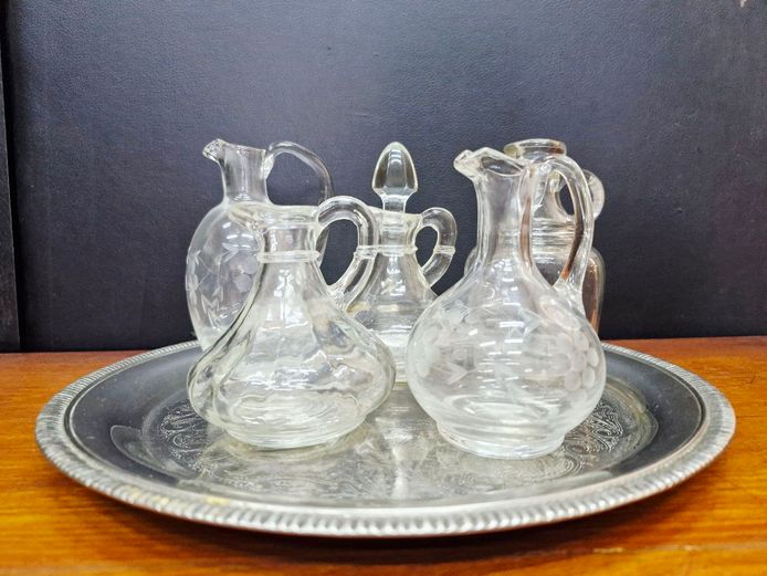 Collection of Vintage Glass Cruets on Silver Tray