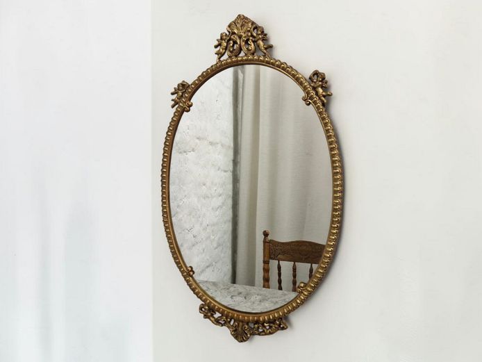Neoclassical-Style Oval Cherub Motif Cast Metal Wall Mirror