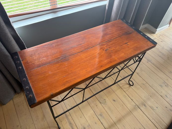 Wrought iron coffee table with wooden top