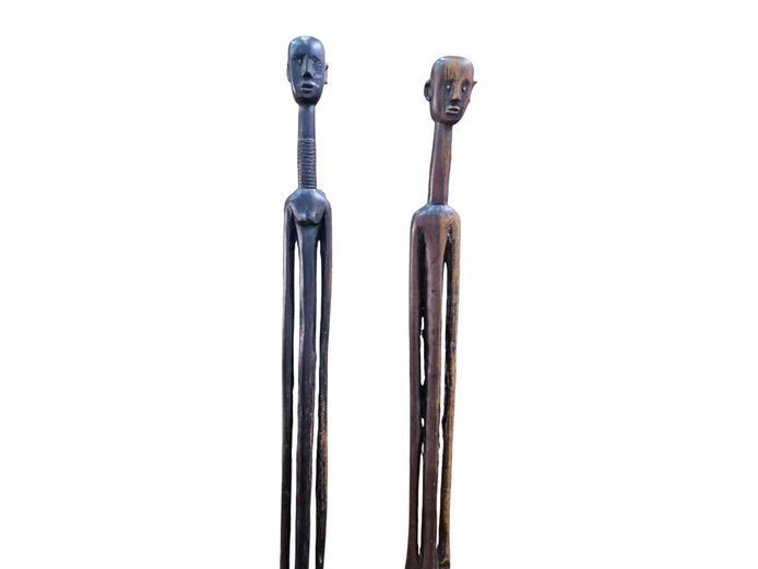 Pair of Mid-to-Late 20th Century African Elongated Carved Wooden Sculptures