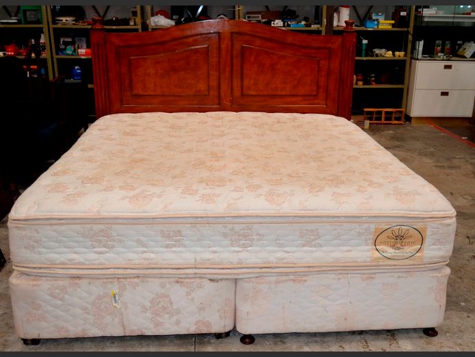 SEALY POSTUREPEDIC KING SIZE BED SET: MATTRESS ON TWIN BASES WITH DARK STAINED HEADBOARD [Needs a clean, mattress sunken]