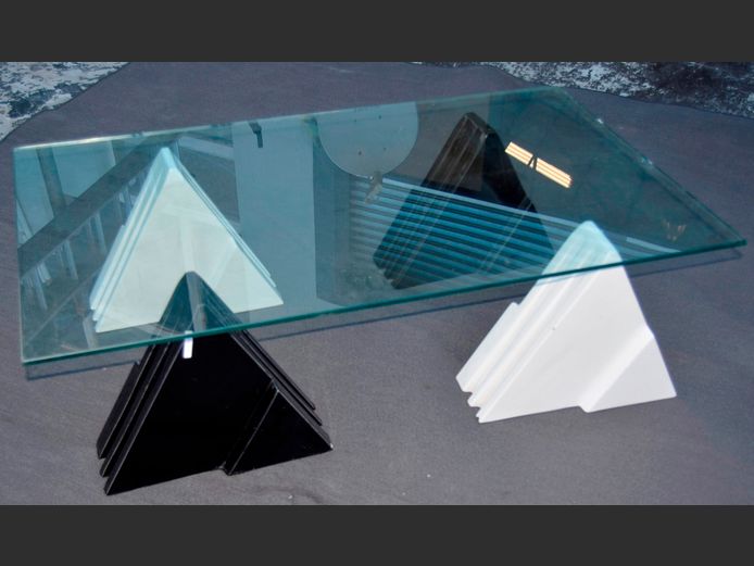 GLASS TOP COFFEE TABLE ON WHITE CERAMIC BASES, 120 x 70 x 35cm [Glass chipped in places]