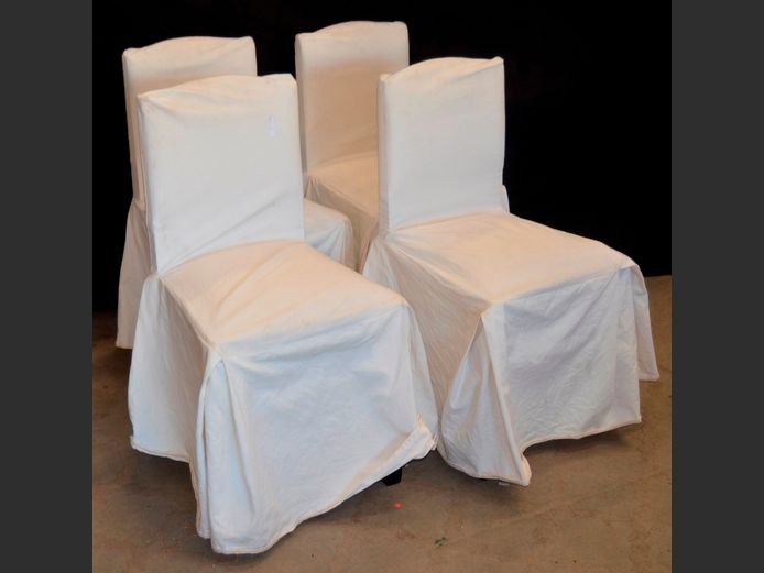 SET OF 4 TEAK & WHITE UPHOLSTERED DINING CHAIRS WITH CHAIR COVERS [1 chair damaged]