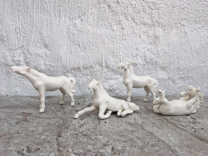 Decorative White Ceramic Equine Collection – Set of 4 Horses in Standing, Reclining, and Rolling Poses