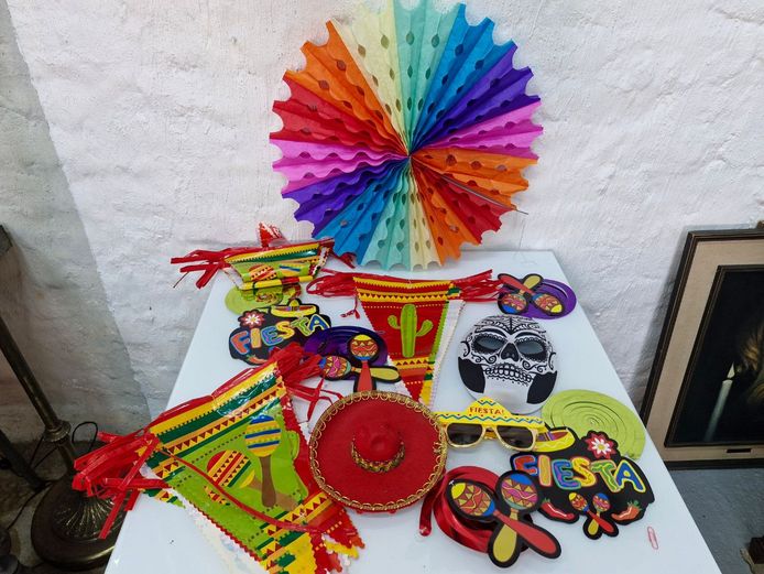 Mexican Fiesta Themed Party Supply Selection, Including Rainbow Honeycomb Fan, Bunting, and Novelty Props
