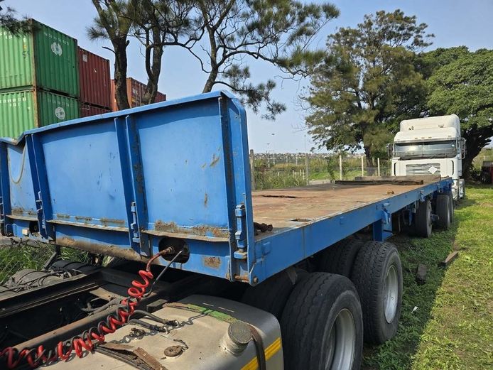  2002 MOTORTRAIL 13m FLATDECK TRI-AXLE TRAILER