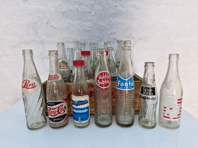 Vintage Wooden Coca-Cola Crate with Assorted Collectible Glass Bottles