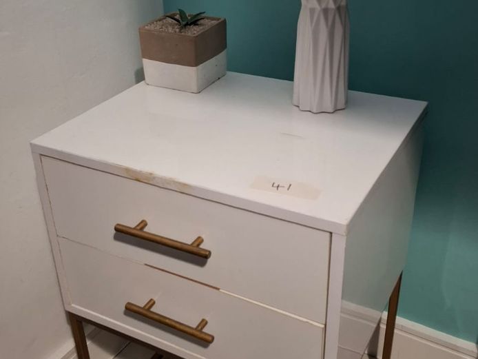 Bedside cabinet, lamp and ornament