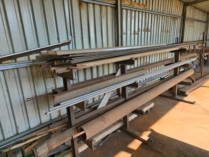 3 x STEEL SHELVES WITH CONTENTS: PIPES, C-CHANNELS +-19 ROOF SHEETS, OFFCUT PIPES, ETC