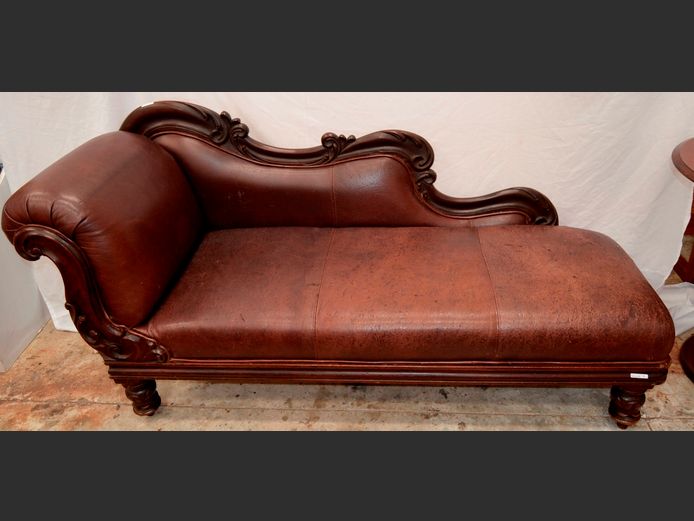 CARVED IMBUIA & LEATHER UPHOLSTERED CHAISE LONGUE, 180 x 63cm [In need of repairs]