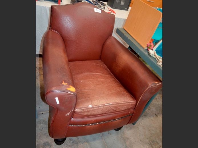 BROWN LEATHER LIBRARY ARMCHAIR WITH STUD DETAIL [Leather torn to arm rests]