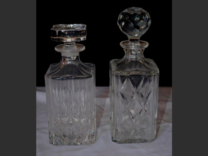 LOT OF 2: CUT GLASS DECANTERS WITH STOPPERS, 26cm High & 23cm High