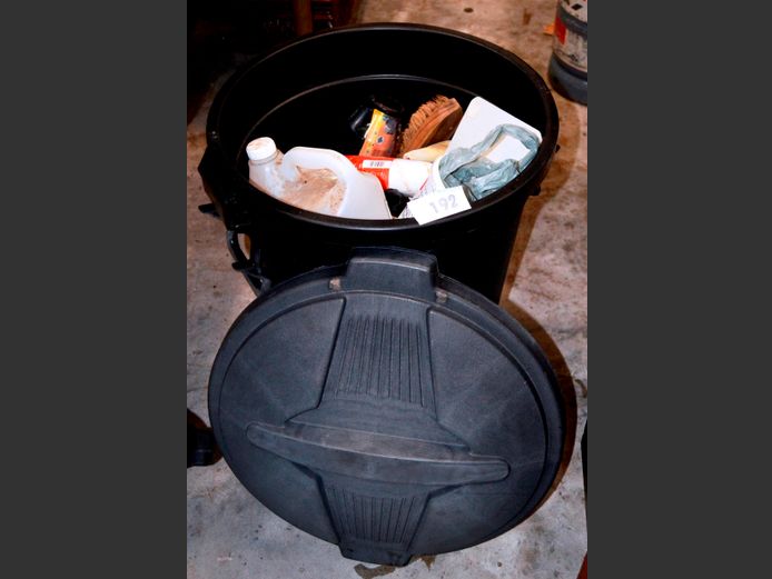 BLACK PLASTIC DUSTBIN WITH LID & CONTENTS
