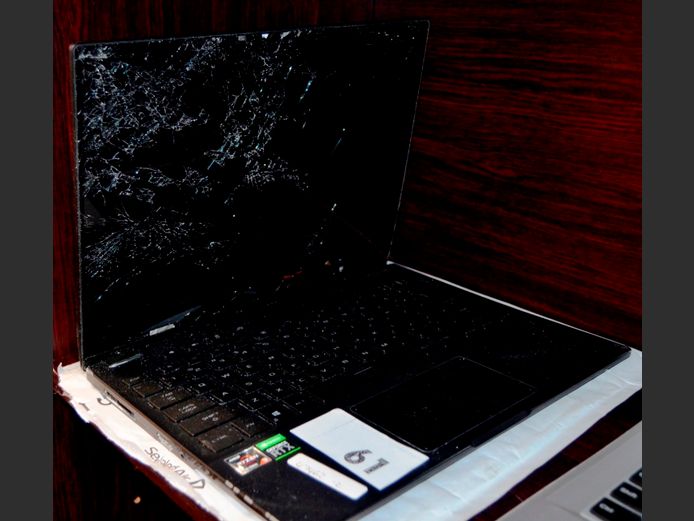 REPUBLIC CFGAMES 13" LAPTOP [Untested, no charger, water damaged, screen damaged]