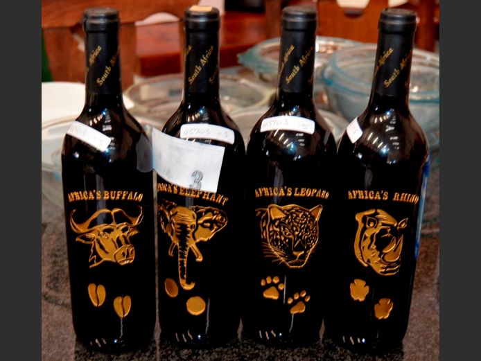 LOT OF 4 BOTTLES: HART OF AFRICAN WINE [Condition of contents unknown]