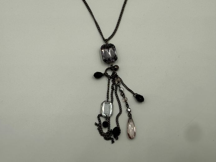 Fine black necklace with charms