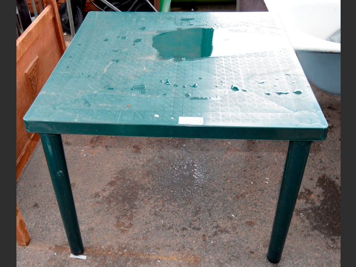 GREEN PLASTIC 4-SEATER PATIO TABLE