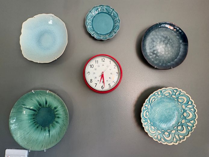 Set of ornamental ceramic wall hanging plates