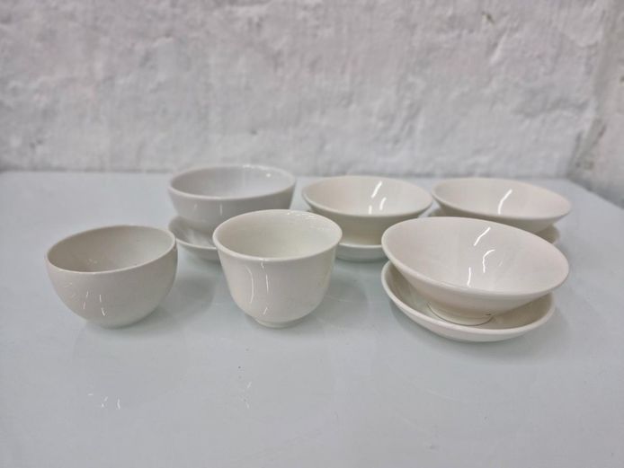 White Mixed Porcelain Tea Cups & Saucers 