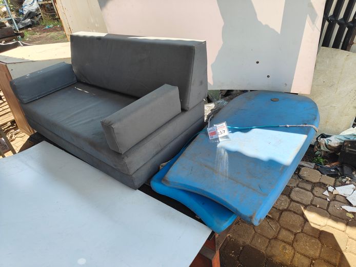SLEEPER COUCH (DOUBLE CAB REAR SEAT) AND SURF BOARDS