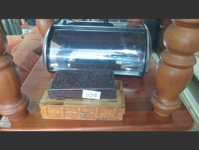 Breadtin and wooden boxes