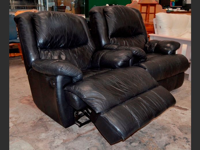PAIR BLACK LEATHER RECLINING ARMCHAIRS [Upholtery repaired]
