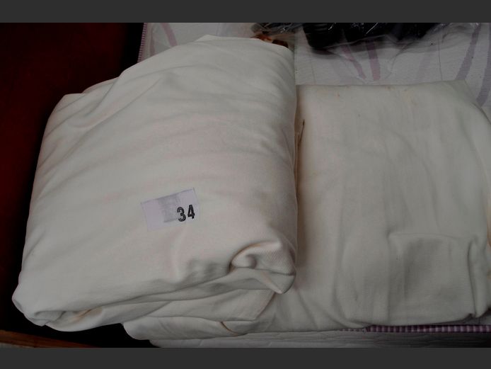 PAIR CREAM LINED CURTAINS