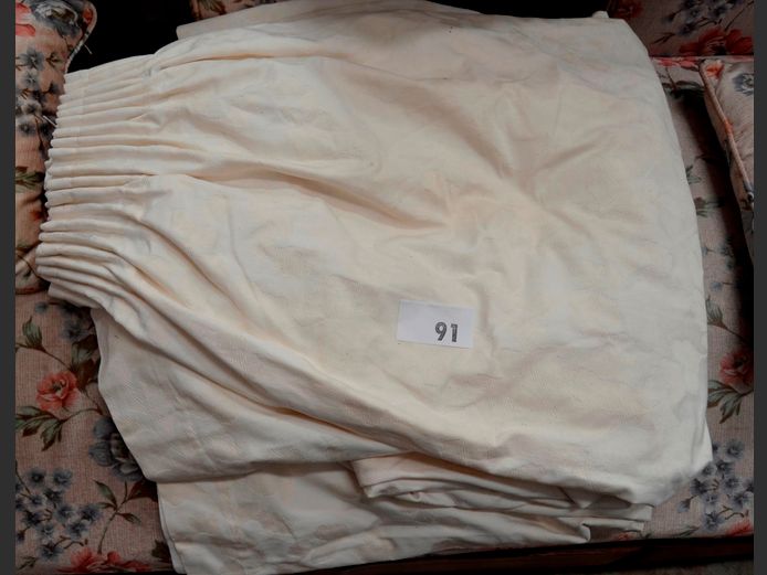 PAIR CREAM LINED CURTAINS