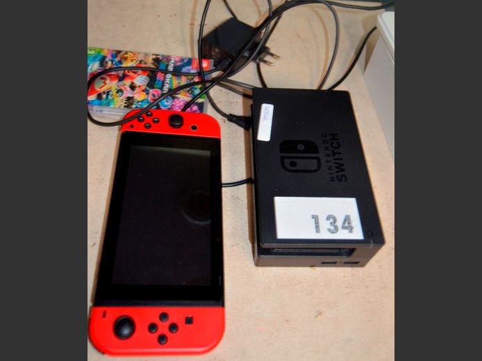 NINTENDO SWITCH WITH CHARGING DOCK [Switches on, untested further]