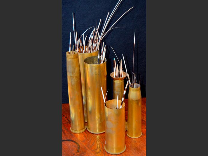 DECORATIVE BRASS ARTILLERY SHELLS WITH PORCUPINE QUILLS