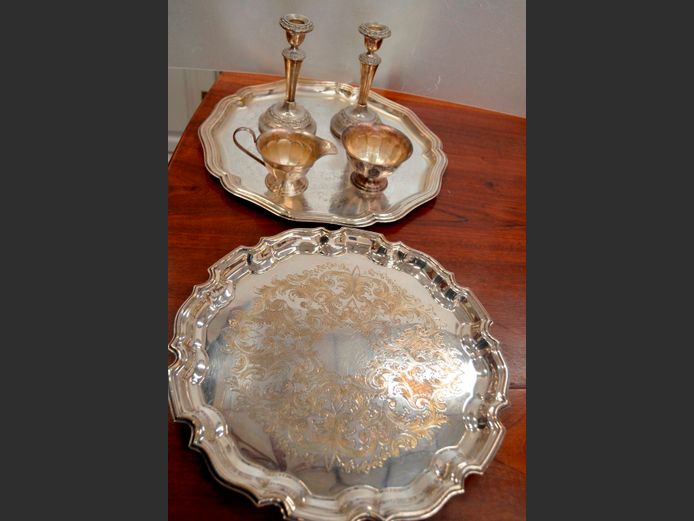 SILVER PLATE: TRAYS, PAIR CANDLESTICKS, SUGAR BASIN & CREAMER [Trays = 40cm & 37cm Diameter; Candlesticks = 19cm High]
