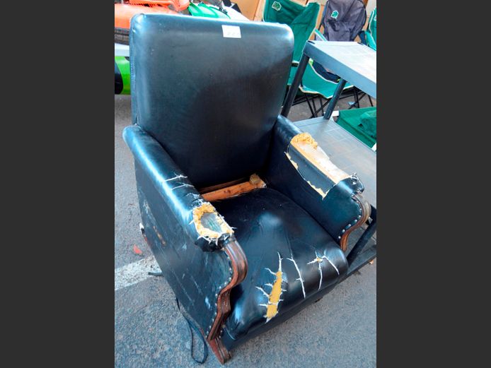 BLACK LEATHER TOUCH ARMCHAIR [Needs restoration]