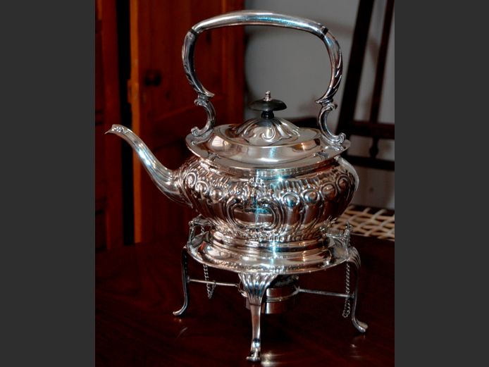 SILVER PLATE TILTING KETTLE ON STAND, 31cm High