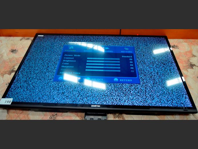 SINOTEC 50" L.E.D. TV [Switches on, faulty] ### LICENCE PLEASE ###