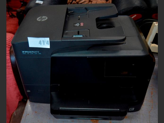 HP OFFICEJET PRO 8710 MULTI-FUNCTION PRINTER [Switches on]