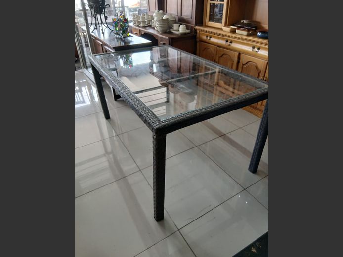 Glass top patio table