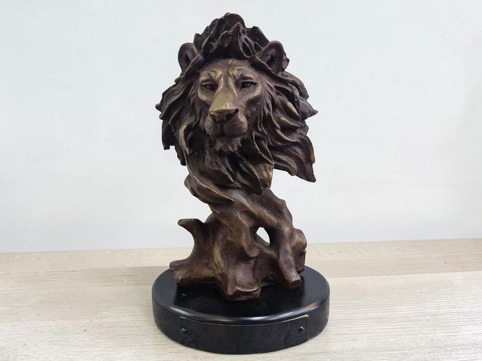 Detailed Lion Bust Sculpture on Plinth